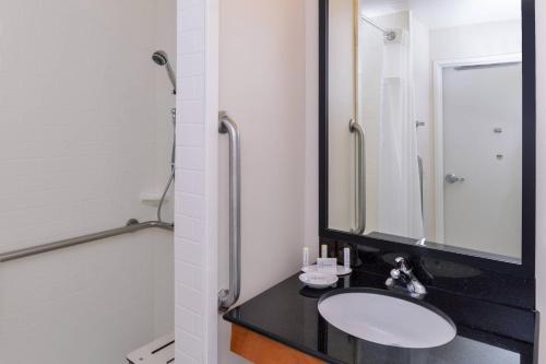 a bathroom with a sink and a mirror at Fairfield Inn & Suites Santa Maria in Santa Maria