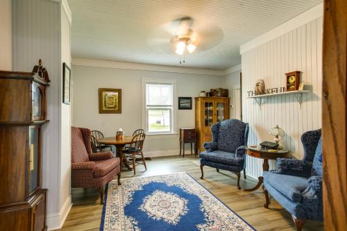 a living room with chairs and a table at Peaceful Country Home in Serene Setting with Yard in Washington