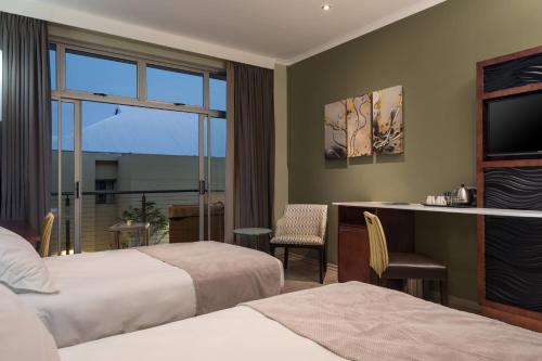 Katil atau katil-katil dalam bilik di Protea Hotel by Marriott Upington