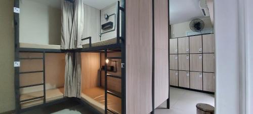a walk in closet with bunk beds in a room at Hostel Leblon in Rio de Janeiro