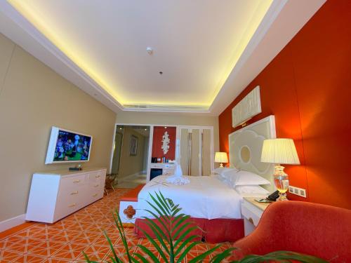 TV a/nebo společenská místnost v ubytování Continental Xin Hao Hotel and Resort 洲际新濠酒店
