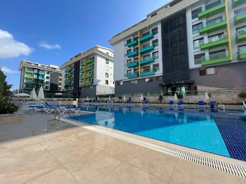 BRAND NEW 1+1, 70 M SEA, LUXURY COMPLEX, LARGE POOL, TENIS, GARAGE, GYM