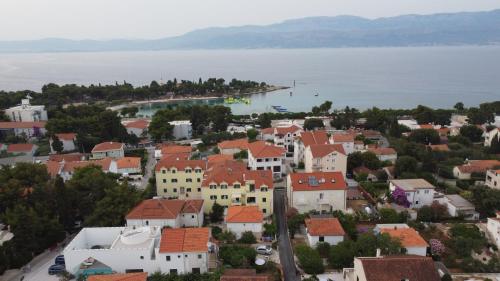 an aerial view of a town next to the water at Holiday house Barbara in Supetar
