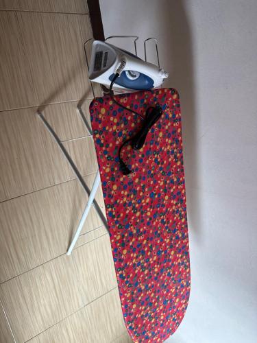 a tie hanging from a wall with a camera at Townes Huge Home Big Grps Big Fam Near SM Ecoland DGT Coastal road ADDU UM in Davao City