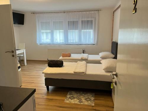 Posteľ alebo postele v izbe v ubytovaní OPG - ZM APARTMANI MARTINOVIĆ