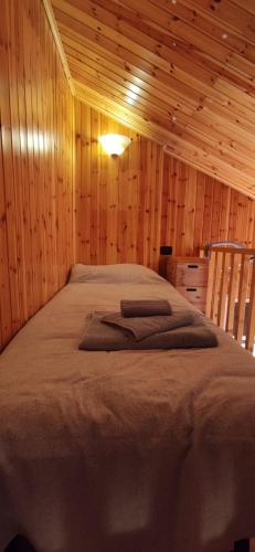 Un pat sau paturi într-o cameră la Aprica 11 Life Mountain