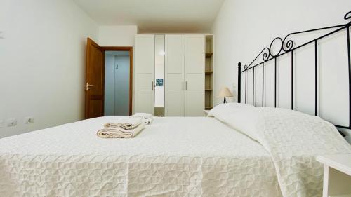 Postel nebo postele na pokoji v ubytování Suite Dream Capricho