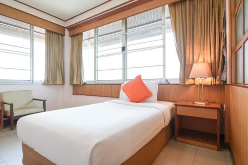 Katil atau katil-katil dalam bilik di Rattana Park Hotel