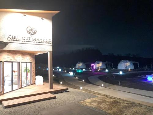 a building with a sign that reads chill out camping at chillout glamping zao in Zao