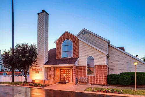 a church with a tall tower on a street at Residence Inn Harrisburg Hershey in Harrisburg