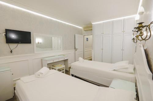 Porto Eda Hotelにあるベッド