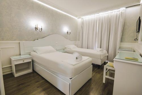 Porto Eda Hotelにあるベッド