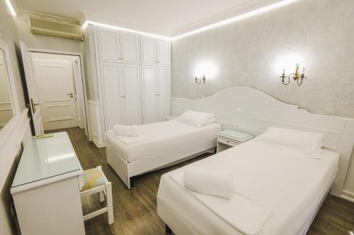 Porto Eda Hotelにあるベッド