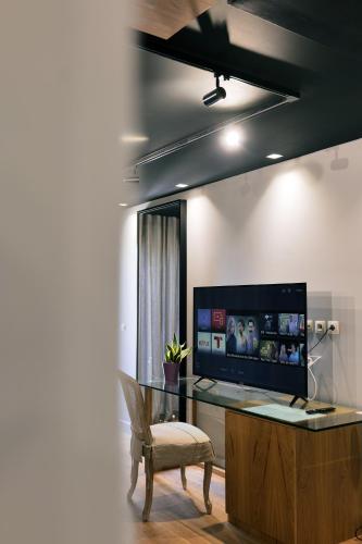 Porto Eda Hotelにあるテレビまたはエンターテインメントセンター