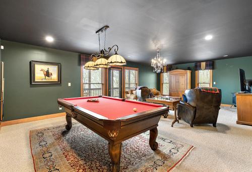 a living room with a pool table in it at Bella Vista in Beech Mountain