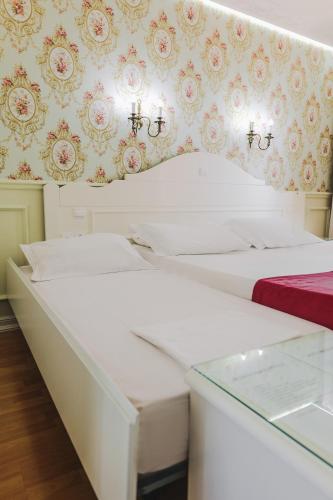 Porto Eda Hotelにあるベッド