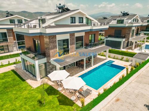 Výhled na bazén z ubytování Galaxy Villas in Fethiye nebo okolí
