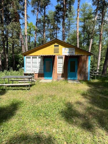 a small shack in the middle of a field at База відпочинку Енергія in Rudnya Peskovskaya