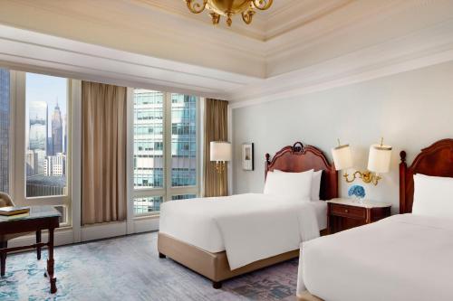 Ένα ή περισσότερα κρεβάτια σε δωμάτιο στο The Ritz-Carlton, Guangzhou