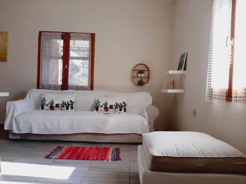 Кровать или кровати в номере Alba Traditional Countryhouse New Anchialos village