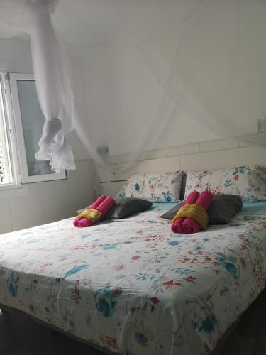 Ένα ή περισσότερα κρεβάτια σε δωμάτιο στο Yumbo room