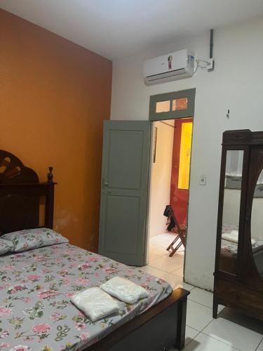 Ένα ή περισσότερα κρεβάτια σε δωμάτιο στο Casa no Centro 23