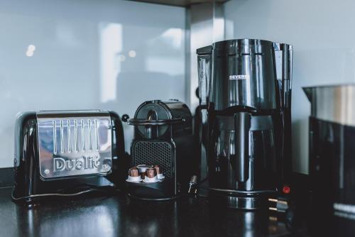 a coffee maker sitting on top of a counter at Chalet Badia by we rent, SUMMERCARD INCLUDED in Zell am See
