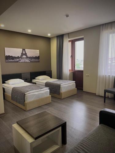 Una cama o camas en una habitación de Bien hotel
