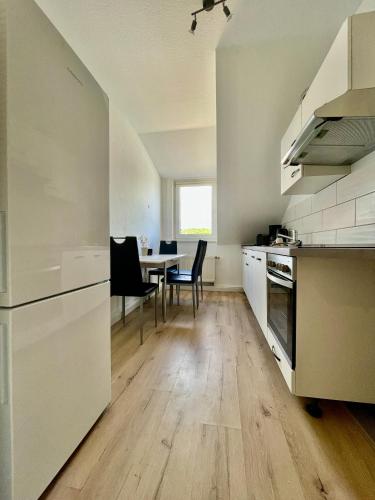 Kuchyň nebo kuchyňský kout v ubytování Zentral gelegene DG-Wohnung mit 4 Schlafzimmern