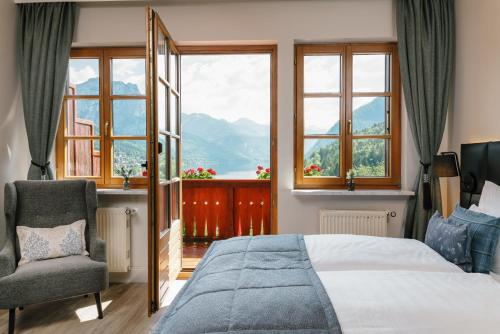 Posteľ alebo postele v izbe v ubytovaní MONDI Hotel am Grundlsee
