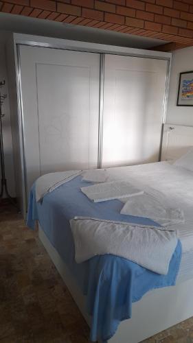 Ένα ή περισσότερα κρεβάτια σε δωμάτιο στο BAT Apart Otel