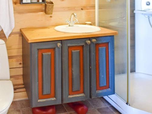 a bathroom with a sink and a shower at 6 person holiday home in HURDAL-By Traum in Hurdal