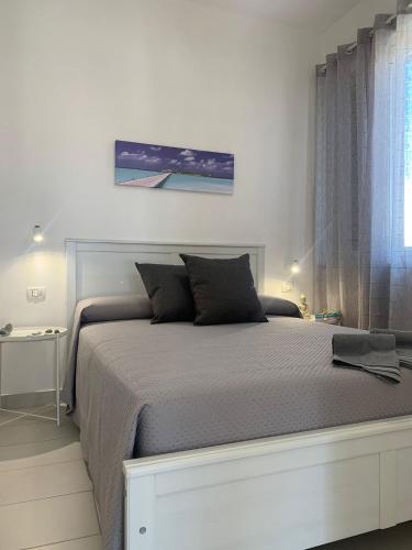 Postel nebo postele na pokoji v ubytování Casa Tuminello Granelli