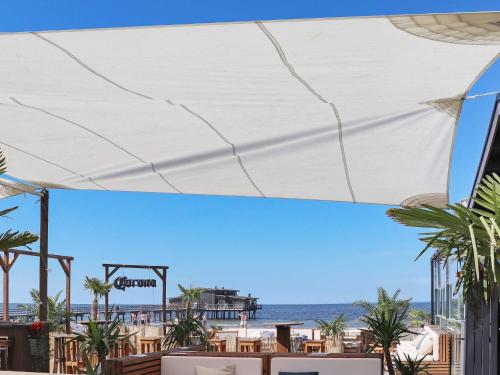 a view of the ocean from the patio of a resort at 5 person holiday home in Båstad-By Traum in Båstad