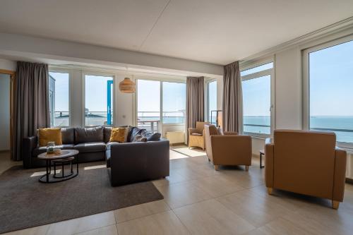 Ruang duduk di Strandappartementen De Gulden Stroom