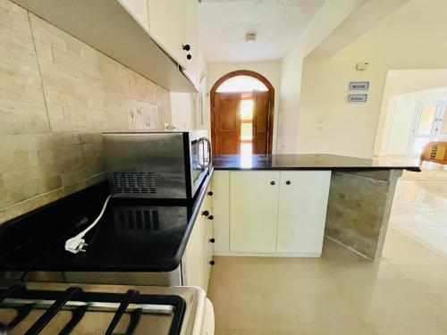 Η κουζίνα ή μικρή κουζίνα στο Amoon village North coast قرية امون السياحية الساحل الشمالي