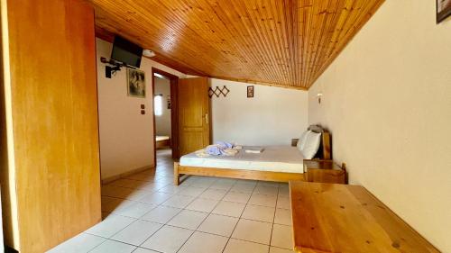 Katil atau katil-katil dalam bilik di Hotel Karagiannis