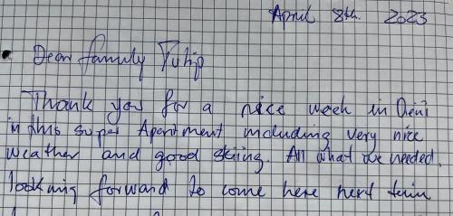 a piece of paper with handwriting on it at Casa Ucliva - Charming Alpine Apartment Getaway in the Heart of the Swiss Alps in Rueras