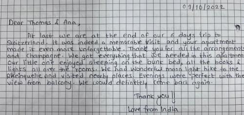 a piece of writing on a sheet of paper at Casa Ucliva - Charming Alpine Apartment Getaway in the Heart of the Swiss Alps in Rueras