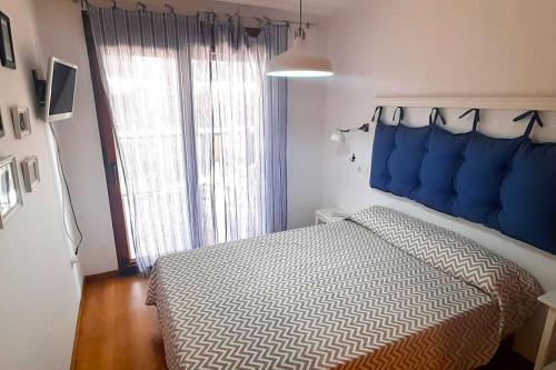 Postel nebo postele na pokoji v ubytování Playa Foz con Piscina y Terraza