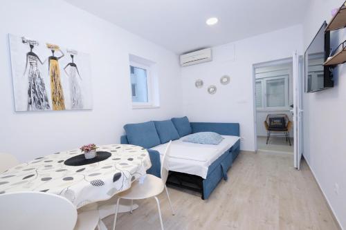 TV a/nebo společenská místnost v ubytování Apartment Smile