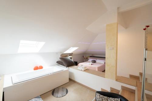 Asterias Residence - Rooms & SPAにあるベッド