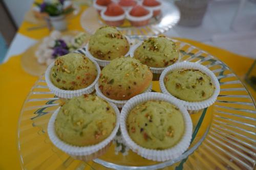 a glass plate with cupcakes on a table at Hotel Albatros in Ischia