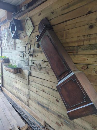 a wooden wall with a stove on it at The Old Hay Barn in Bursledon