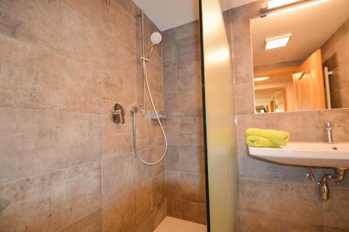 a bathroom with a shower and a sink at Pension Wendlhof in Obergurgl