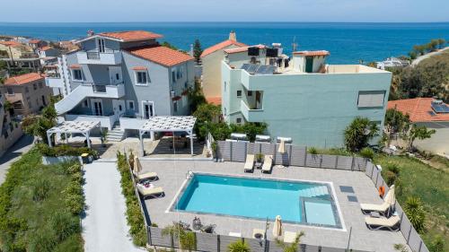 an aerial view of a house with a swimming pool at Casa Di Kasapa in Panormos Rethymno
