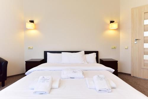 Cama o camas de una habitación en Cozy stay by Kaunas vila 9Vėjai
