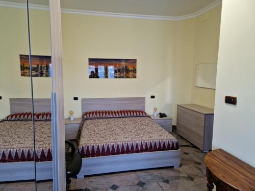 Кровать или кровати в номере Castelbarco House A