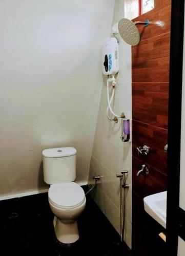 Koupelna v ubytování Red Triangle Cottage Roomstay Kerteh Paka