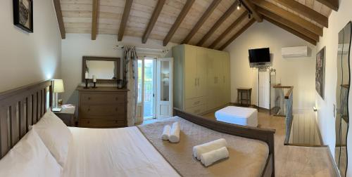 Postel nebo postele na pokoji v ubytování KATSANTONIS LUXURY HOUSE